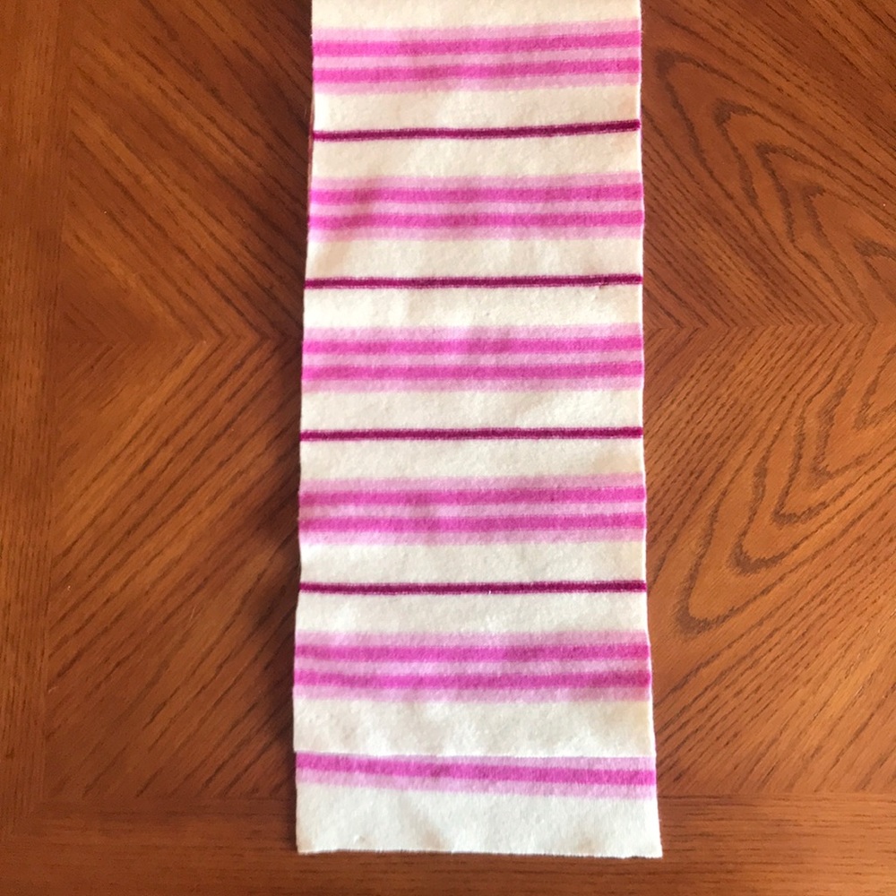 Burberry pink and off white scarf.